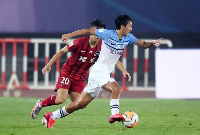 九游体育下载-国足增调常飞亚入队 韦世豪因伤暂无法正常训练